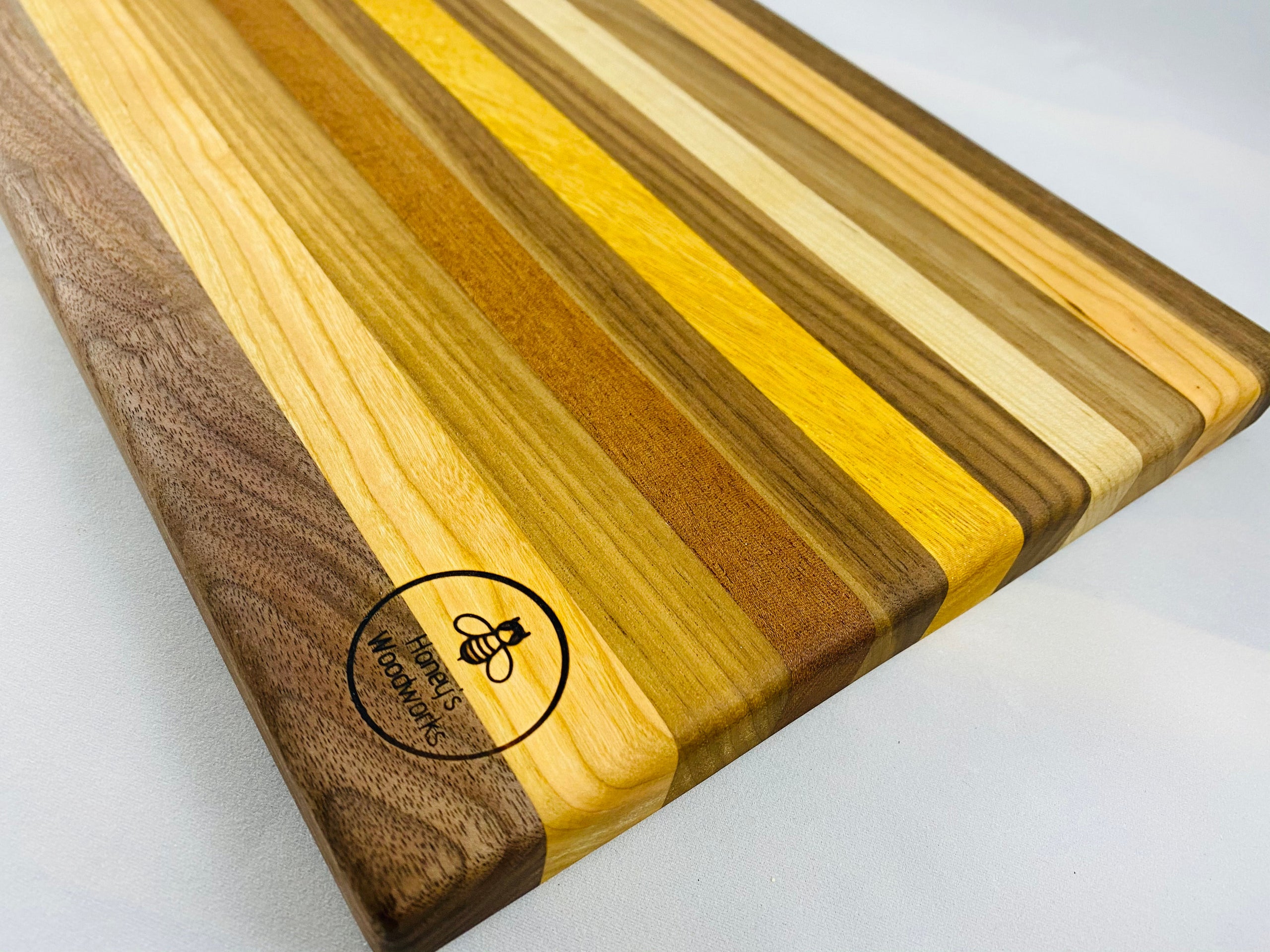 walnut-canarywood-cherry-sapele-maple-edge-grain-cutting-board